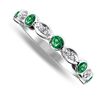 Nine carat white gold emerald and diamond band ring